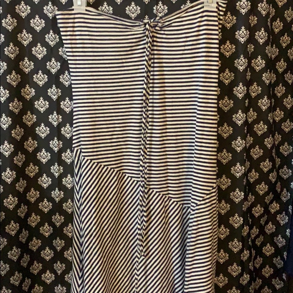 Asymmetrical dress.